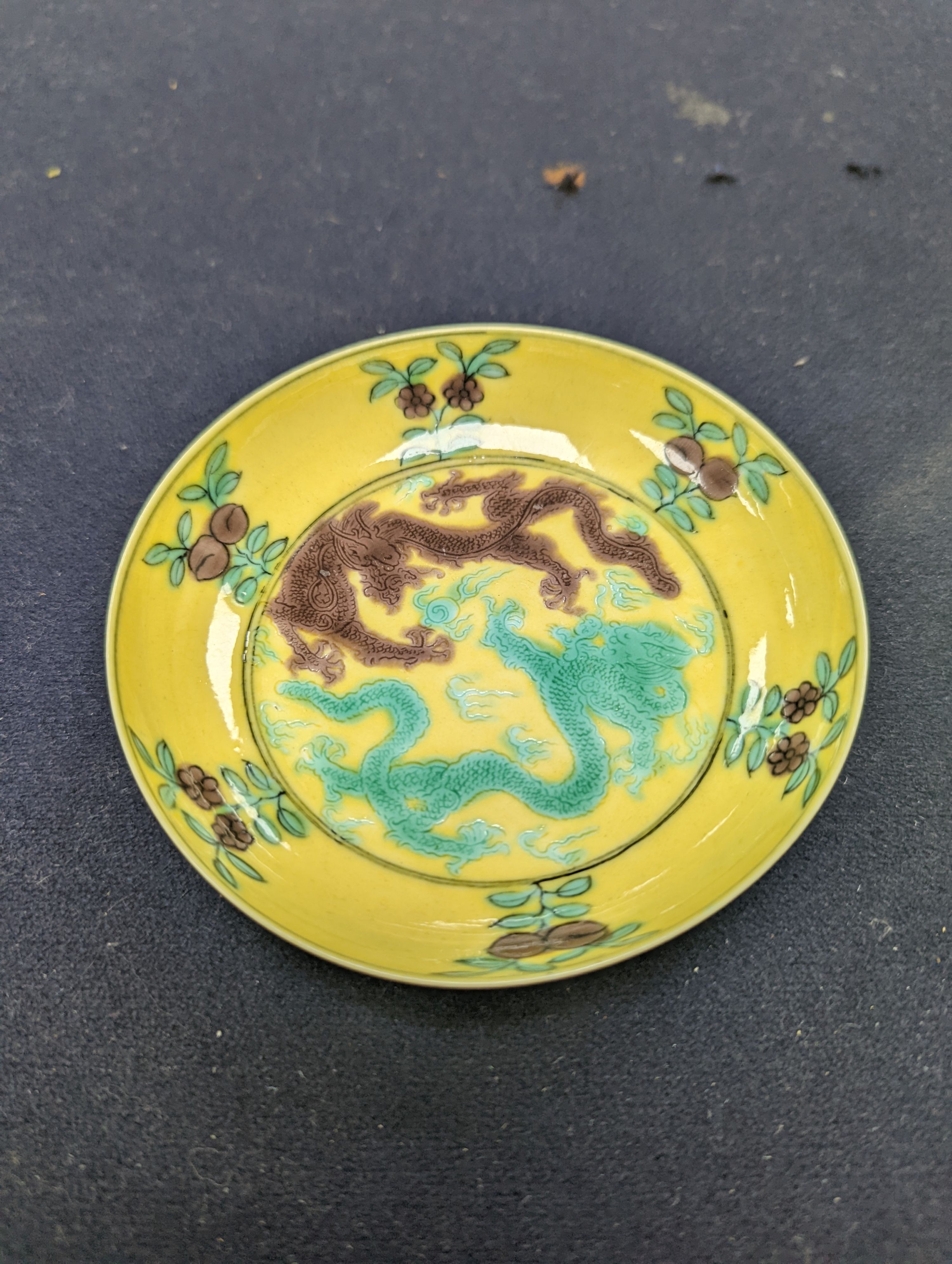A pair of Chinese yellow, green and aubergine dragon dishes, Guangxu marks, 10cm.